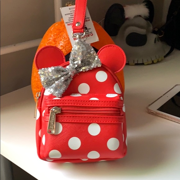 Disney Handbags - Disney Minnie Polkadot Wristlet Red and white